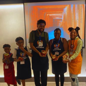 Family with their handmade Panda character bento